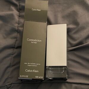 Calvin Klein Contradiction for Men - Silver and Black Bottle